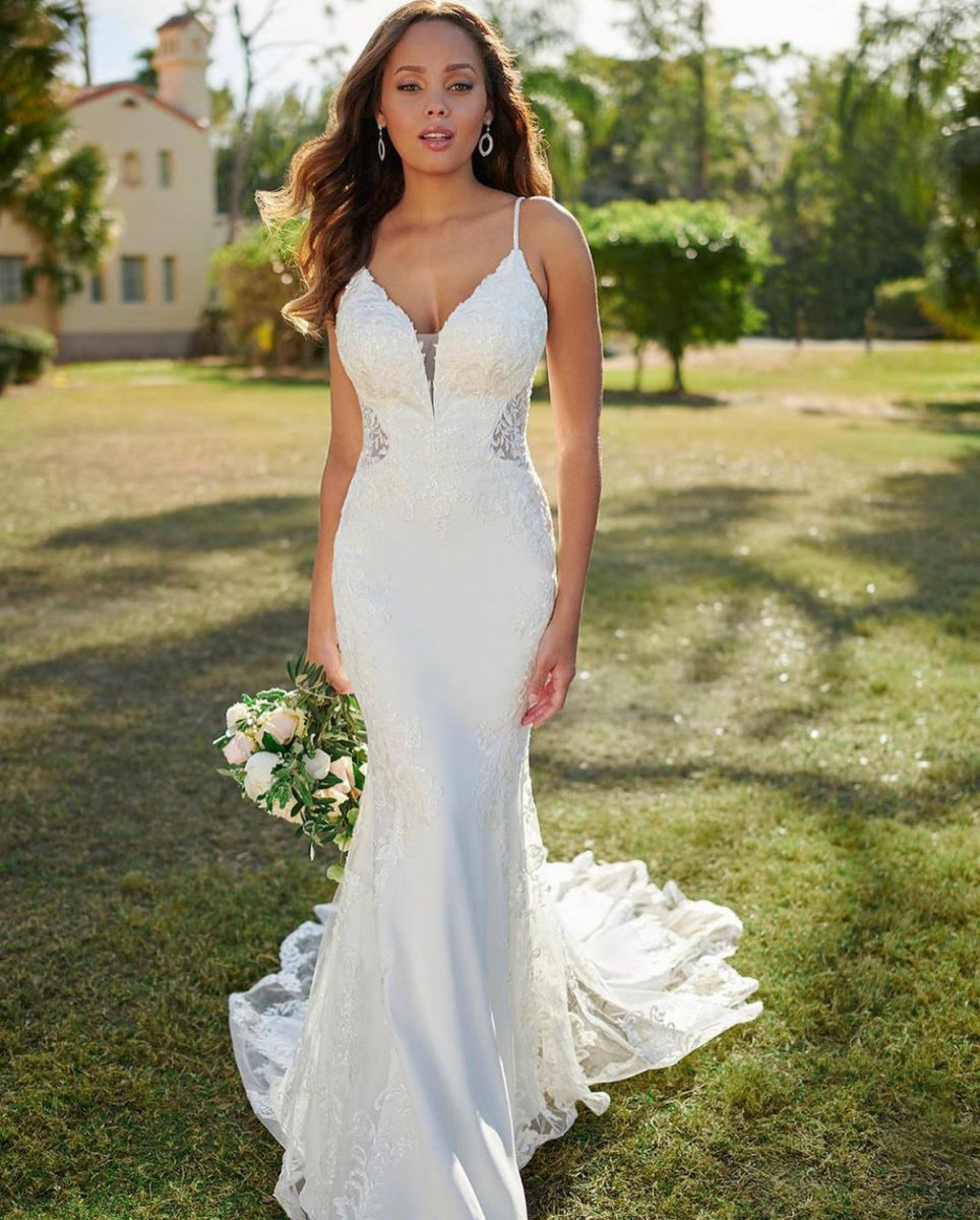 Lace Mermaid Wedding Dress with Spaghetti Straps and Flowing Train Lace Mermaid Wedding Dress with Spaghetti Straps and Flowing Train